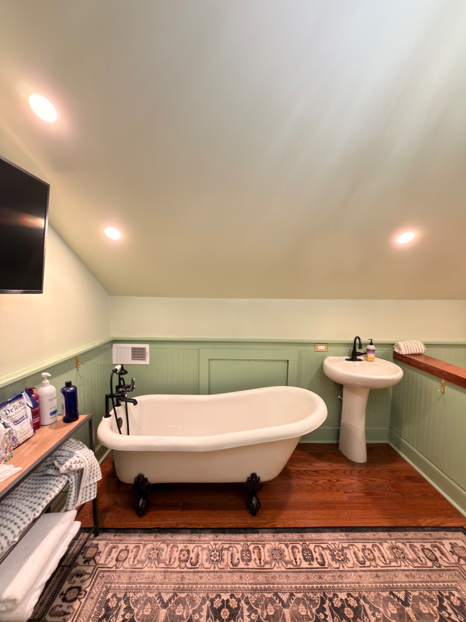 Bathroom with freestanding clawfoot tub